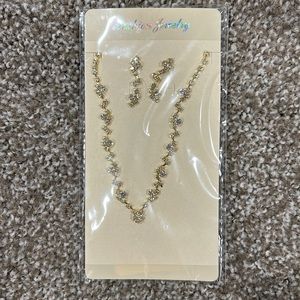 Gold with diamond accept necklace and earrings